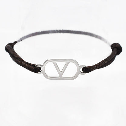 Cross-border source foreign trade hand-woven couple stainless steel Warren V bracelet hollow English letter bracelet adjustable