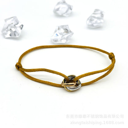 Creative hand-woven three-color three-ring big brand peripheral high-quality square titanium steel bracelet manufacturer wholesale bracelet