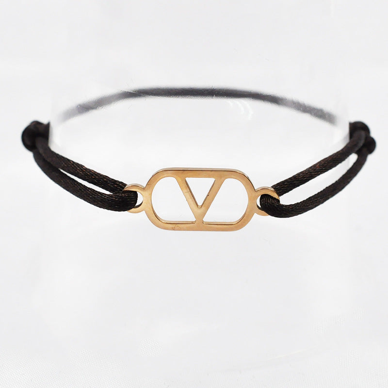 Cross-border source foreign trade hand-woven couple stainless steel Warren V bracelet hollow English letter bracelet adjustable