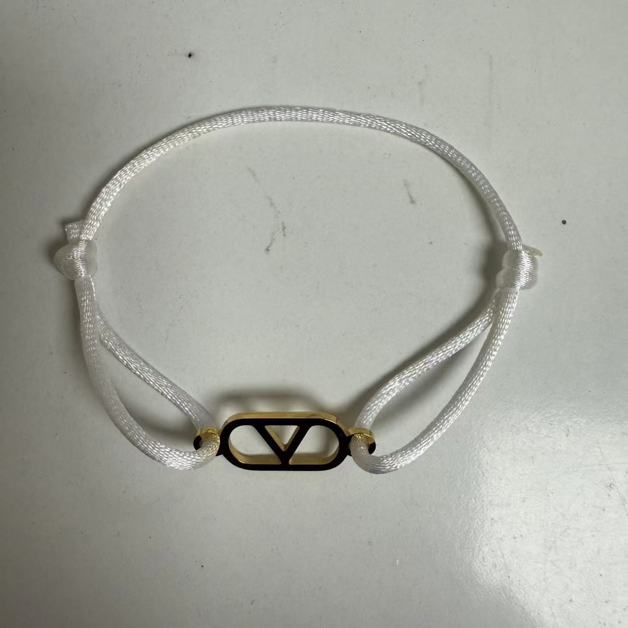 Cross-border source foreign trade hand-woven couple stainless steel Warren V bracelet hollow English letter bracelet adjustable