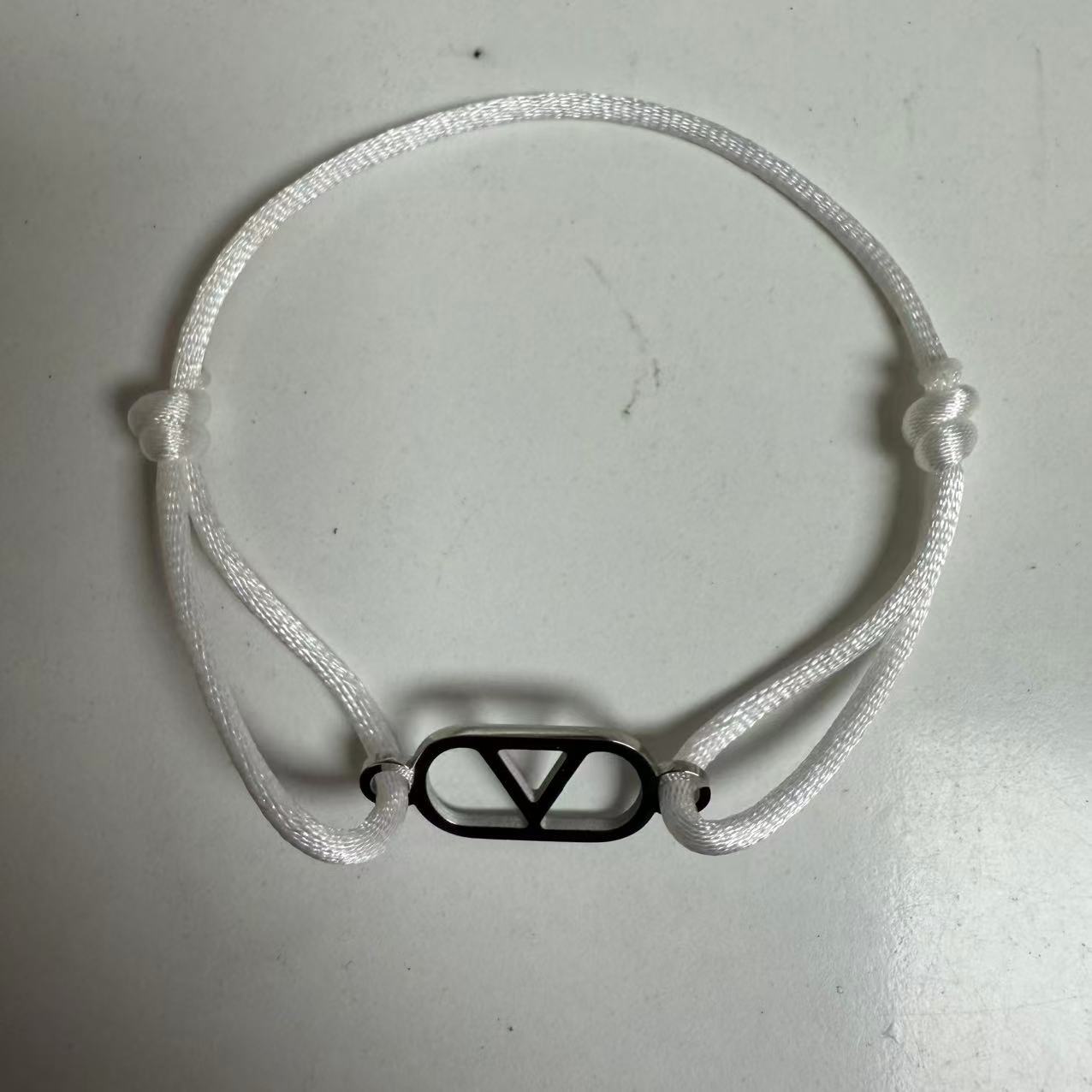 Cross-border source foreign trade hand-woven couple stainless steel Warren V bracelet hollow English letter bracelet adjustable